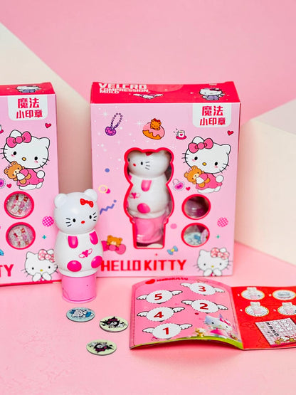 Miso station Hello Kitty compression mold stamp set with pink and white tool, interchangeable discs, and gift box.