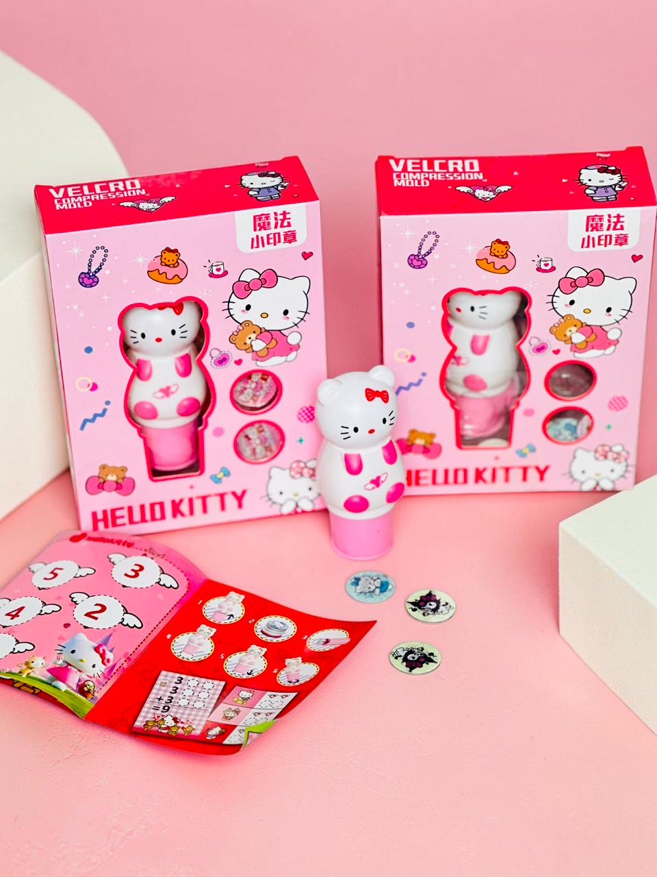 Miso station Hello Kitty compression mold stamp set with pink packaging, stamp tool, and interchangeable designs.