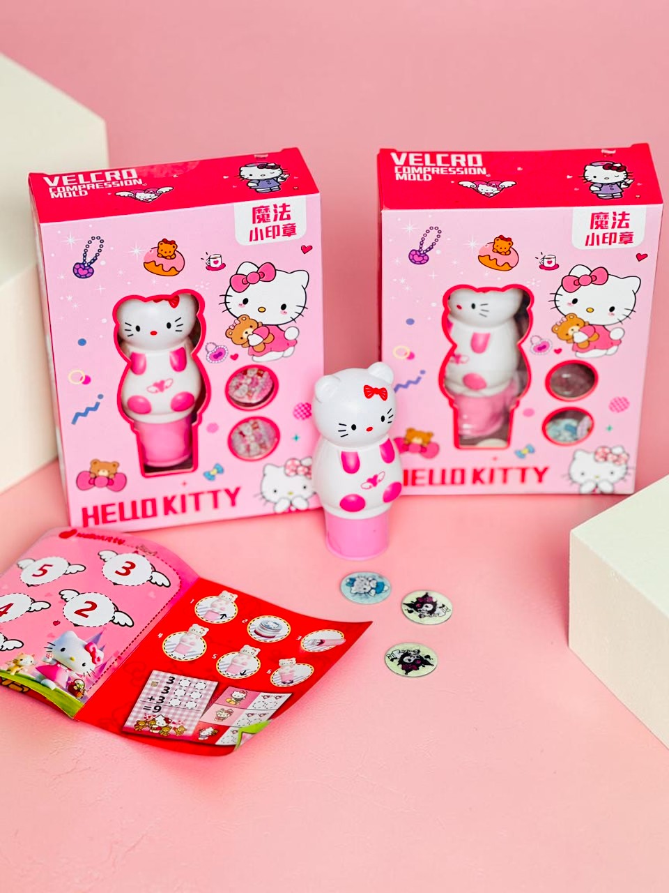 Miso station Hello Kitty compression stamp set with pink and white tool, interchangeable designs, and activity book.