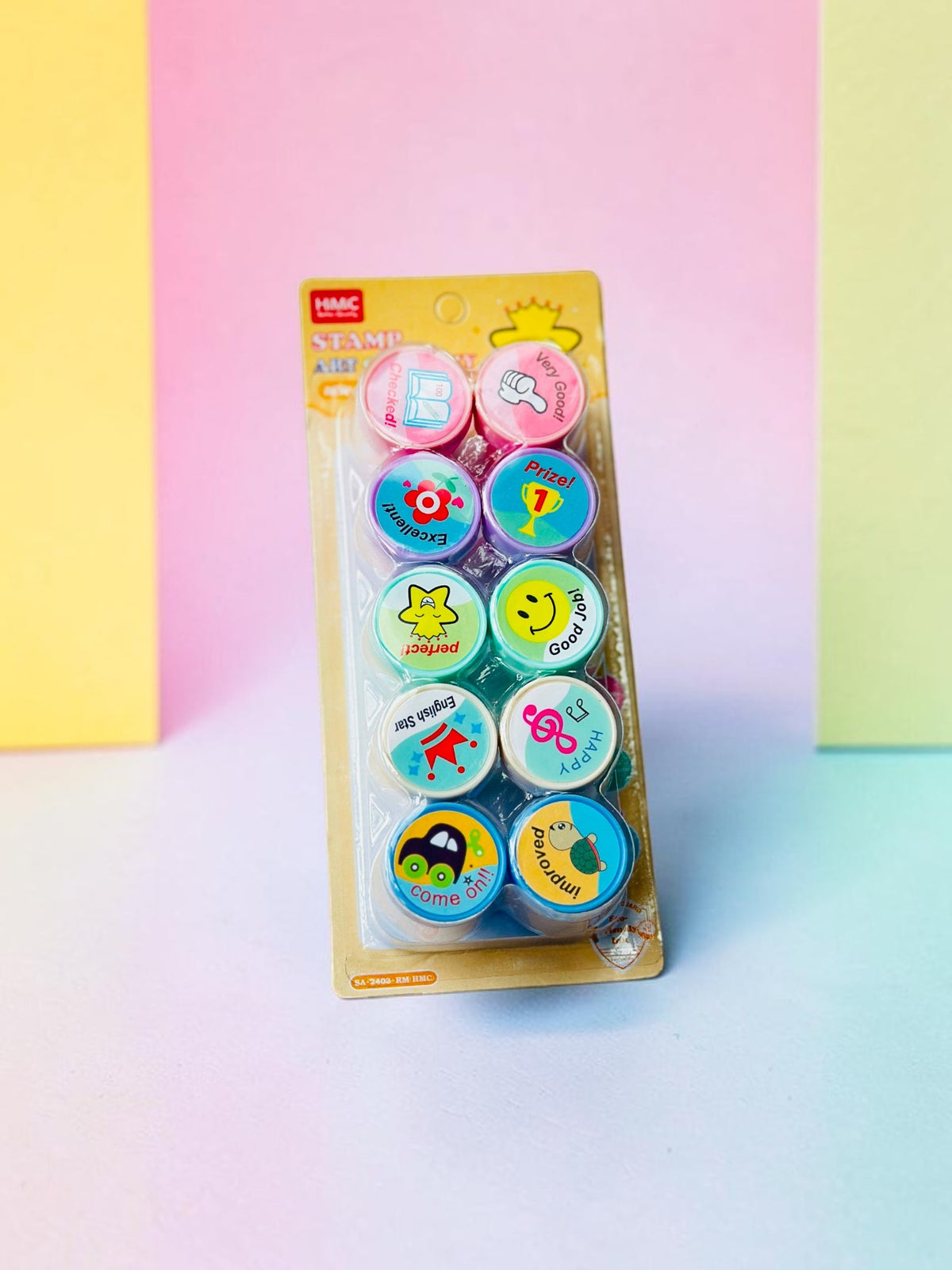 Miso station HMC self-inking teacher stamp set with colorful encouraging phrases and icons on a blister card.