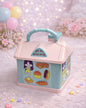 Miso station house-shaped portable piggy bank in pastel pink and blue with cartoon stickers and a carrying handle.