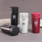Miso station insulated stainless steel travel coffee tumblers in black, white, and red with push-button lids