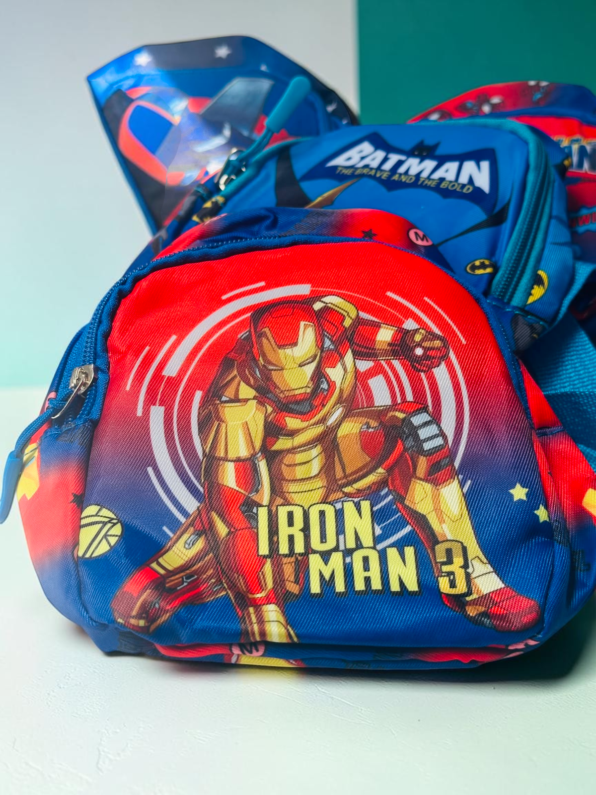 Miso station superhero themed mini backpack featuring Iron Man 3 graphic in vibrant red and blue colors