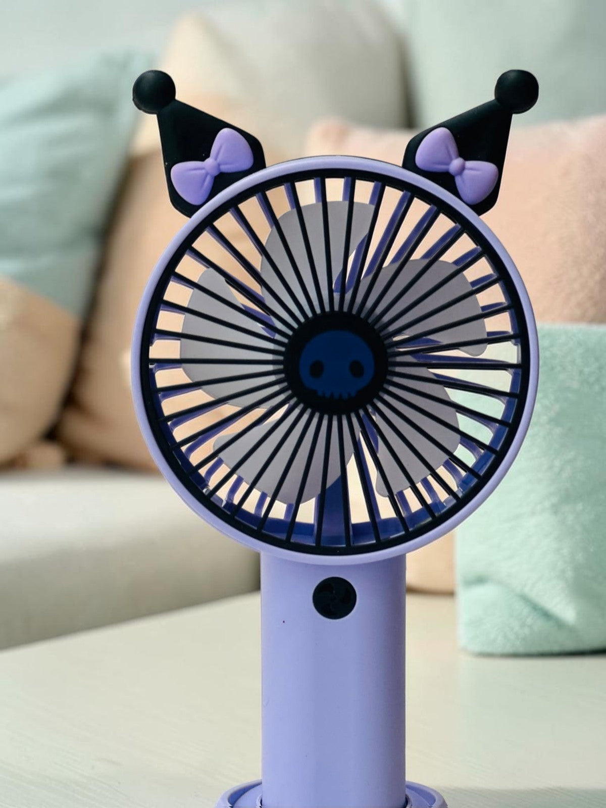 Miso station portable handheld desk fan in purple and black with Kuromi-inspired ears and bow details.
