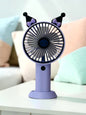 Miso station Kuromi-inspired portable handheld desk fan in purple and black with cute bow and ear details.