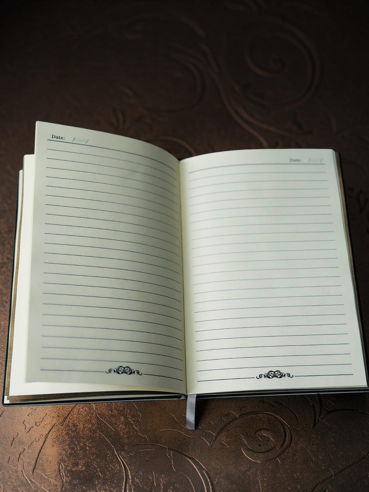 Miso station open journal with lined pages, date fields, and decorative flourishes on a white textured background.