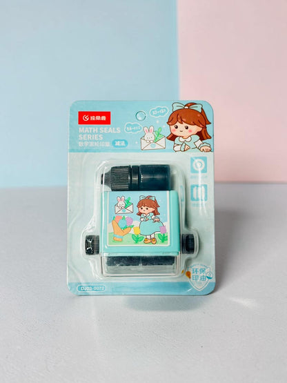 Miso station math roller stamp in teal with cute girl illustration and ink refill bottle in blister packaging