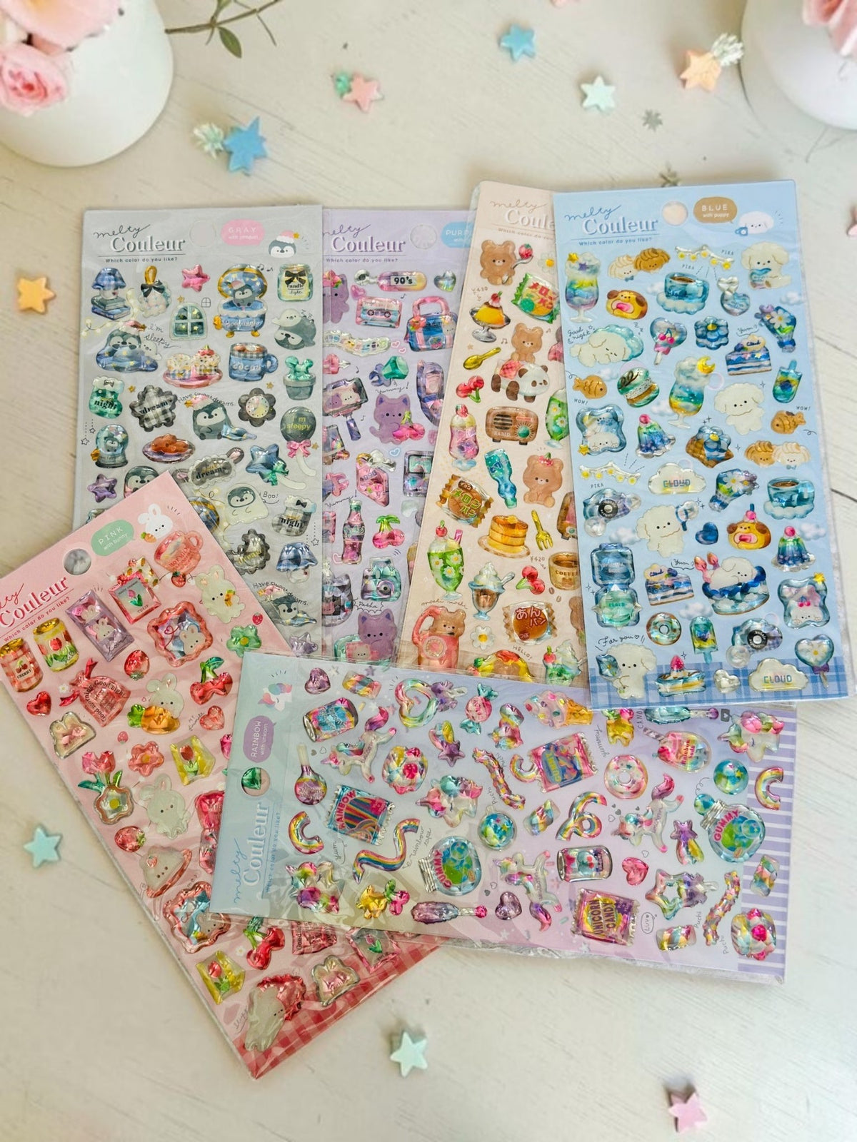 Miso station Melty Couleur puffy sticker sheets featuring colorful animals, sweets, and icons in various themes.