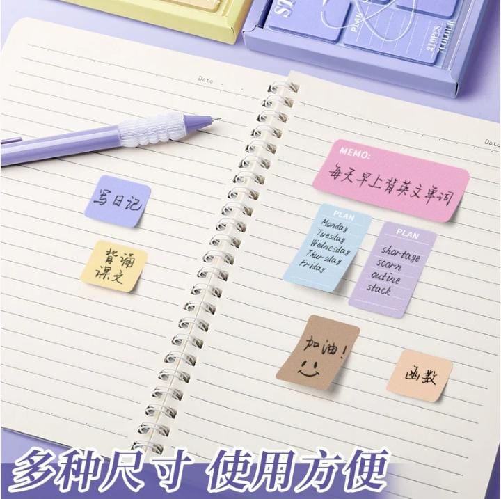 Miso station Starlight Coral Series mini sticky notes in various soft pastel colors applied to a spiral notebook page
