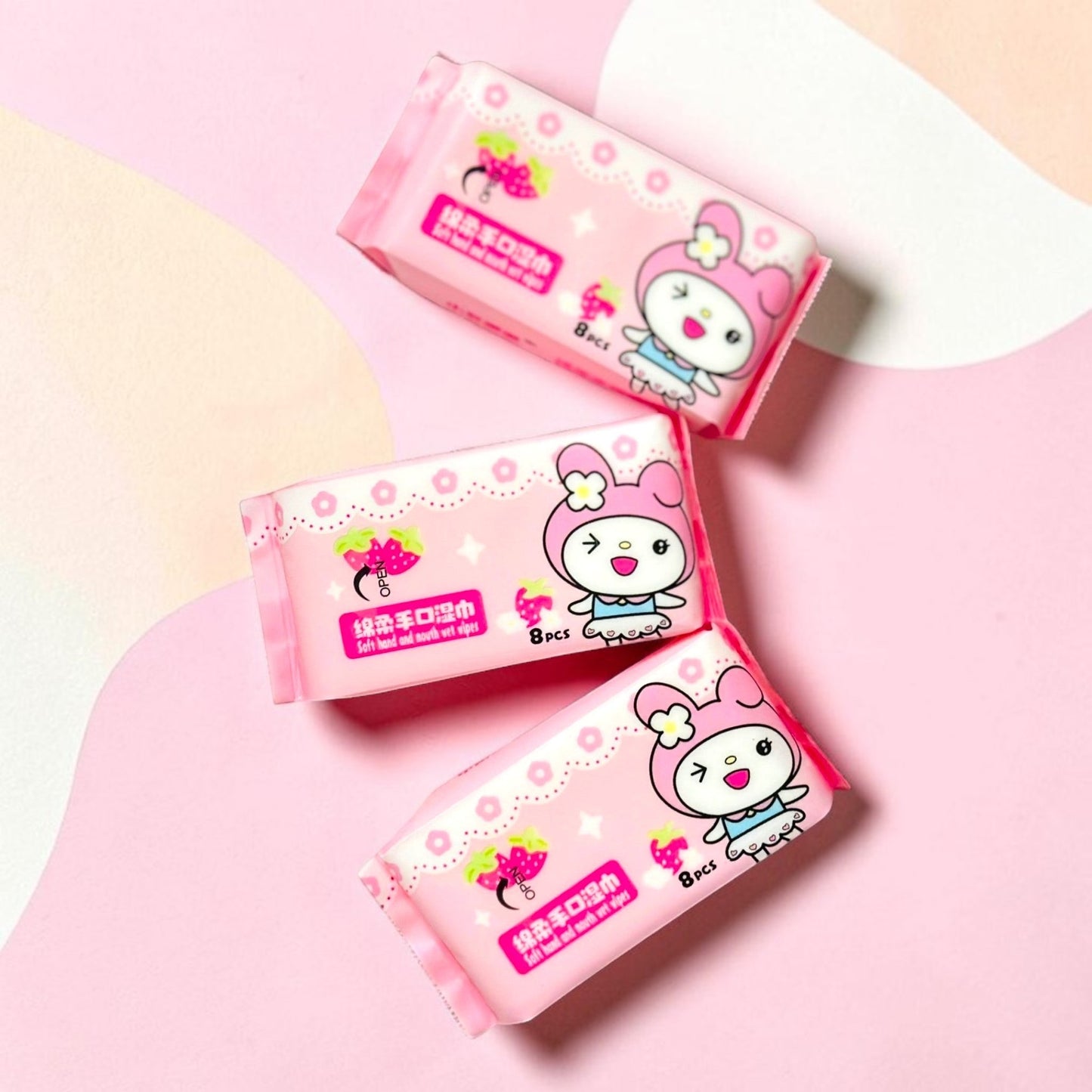 Miso station My Melody themed pink wet wipes packs with strawberry graphics for gentle hand and mouth cleaning.