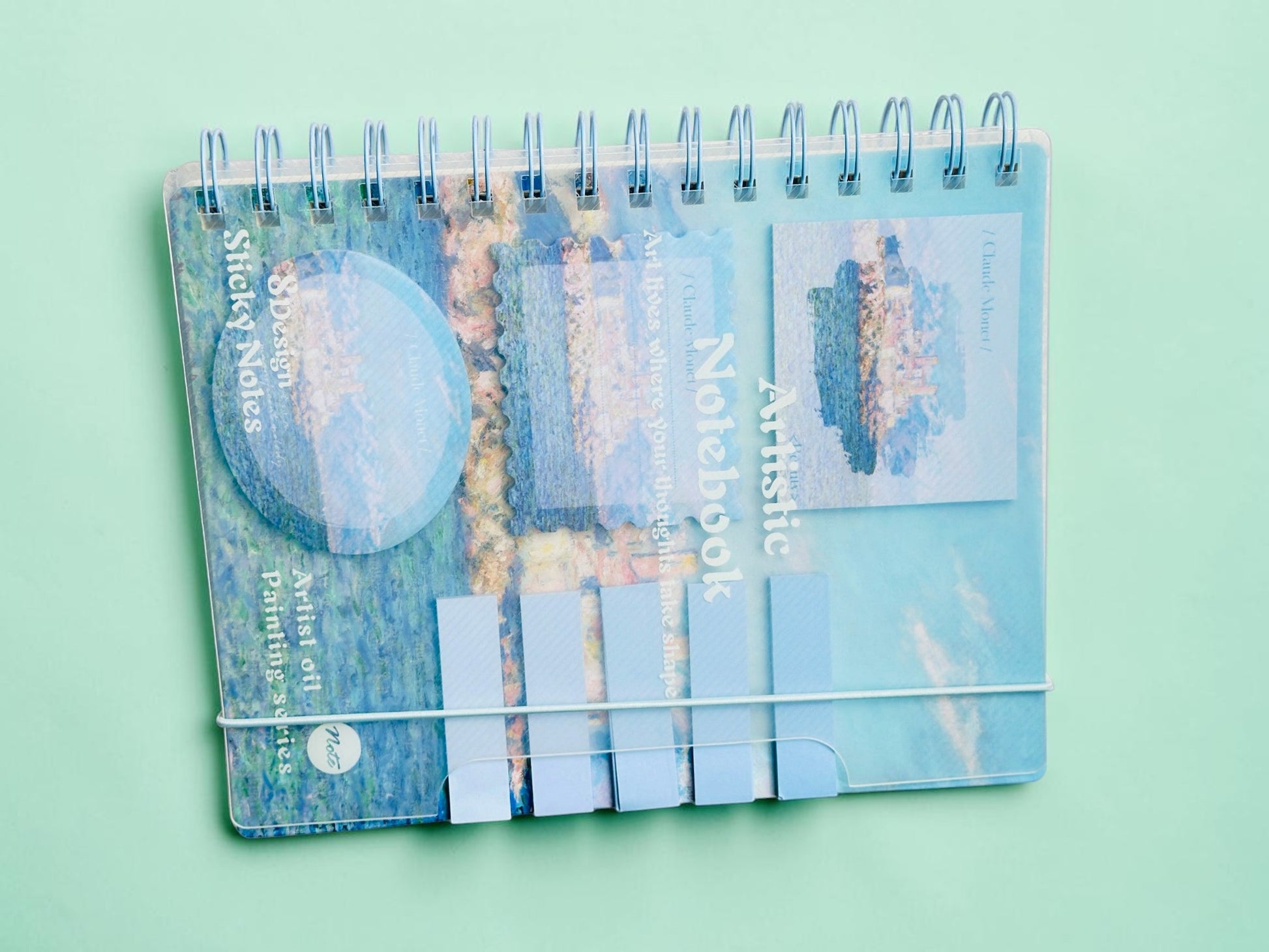 Miso station spiral notebook featuring a blue Claude Monet oil painting cover with integrated sticky notes.