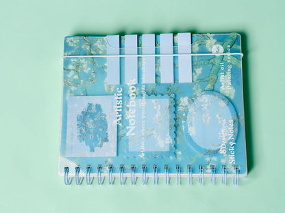 Miso station spiral notebook featuring a blue oil painting cover with integrated sticky notes and page markers.
