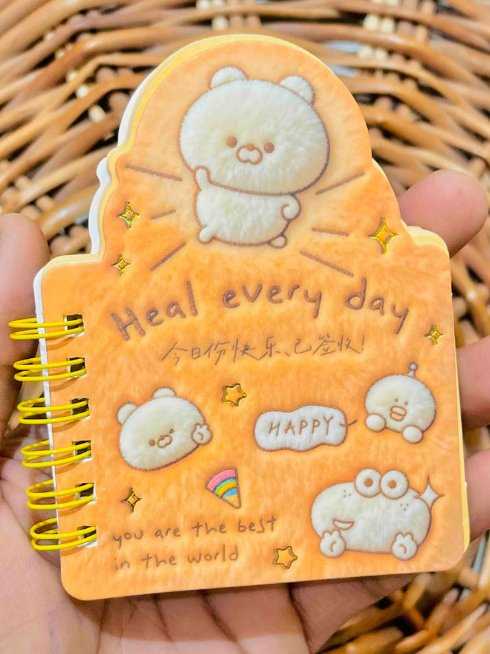 Miso station plush spiral memo notepad in orange with cute cartoon bear characters and uplifting text