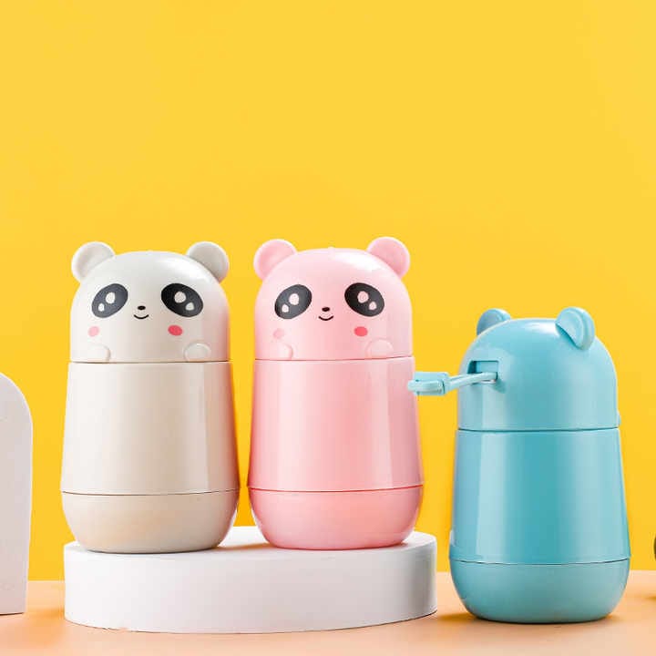 Miso station panda-themed portable manual food processors in white, pink, and blue on a white display stand.