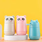 Miso station panda-themed portable manual food processors in white, pink, and blue on a white display stand.