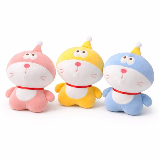 Miso station soft plush toys in pink, yellow, and blue with pointed hats and red collars on a white background