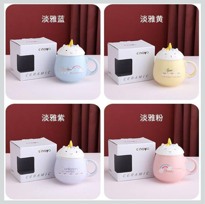 Miso station ceramic unicorn mugs in pastel blue, yellow, purple, and pink with matching lids and gift boxes.