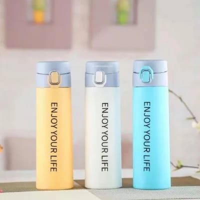 Miso station stainless steel insulated water bottles in pastel yellow, white, and blue with Enjoy Your Life print