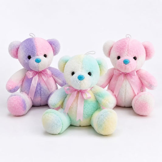 Miso station pastel tie-dye plush teddy bears with satin ribbon bows in purple, blue, pink, and yellow.