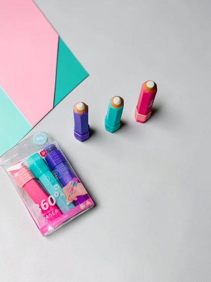 Miso station set of three pencil-shaped precision erasers in vibrant pink, teal, and purple on a white desk surface.