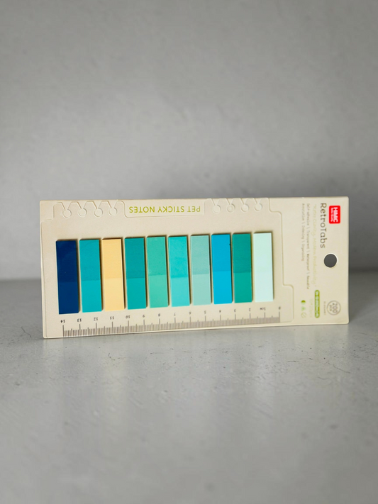 Miso station HIMIC RetroTabs PET adhesive page markers in a gradient of blue and green shades on a ruler backing card