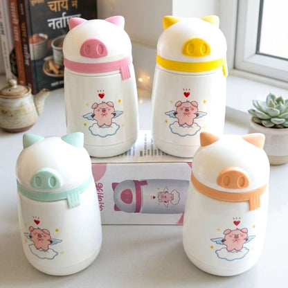 Miso station MengMengzhu pig-themed stainless steel insulated water bottles with colorful lids and angel pig graphics.