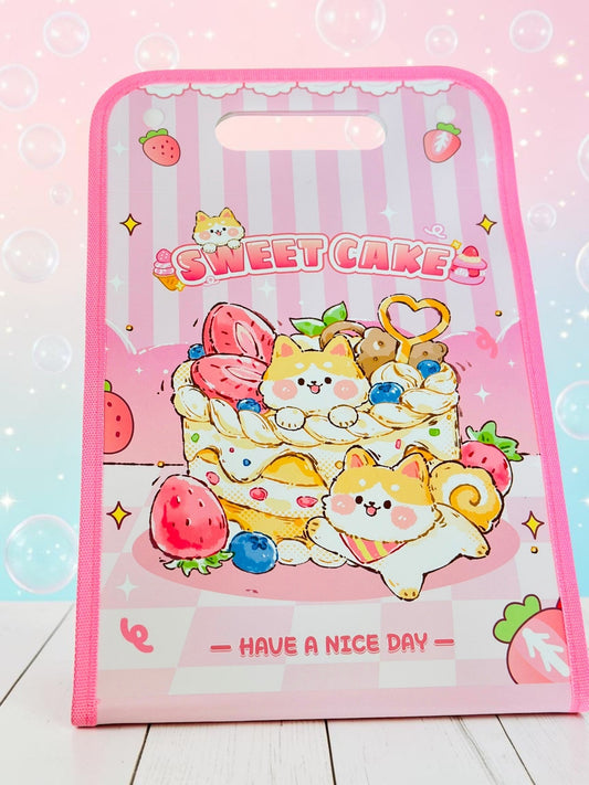 Miso station pink document folder featuring cute cartoon animals and sweet cake illustrations with a die-cut handle
