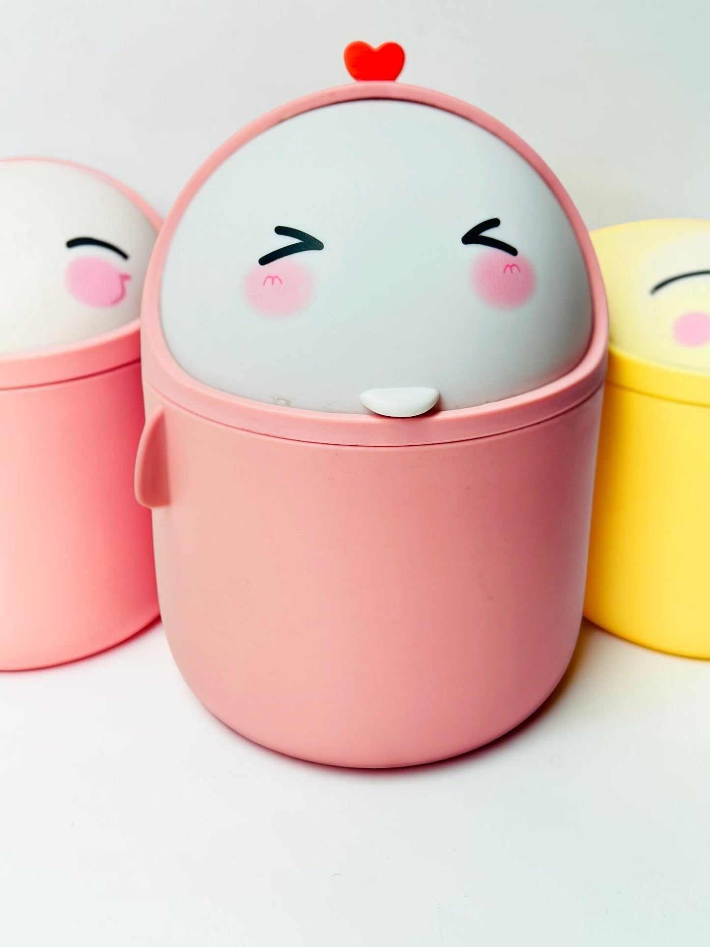 Miso station pink desktop waste bin with a cute character face and a red heart on the swing-top lid