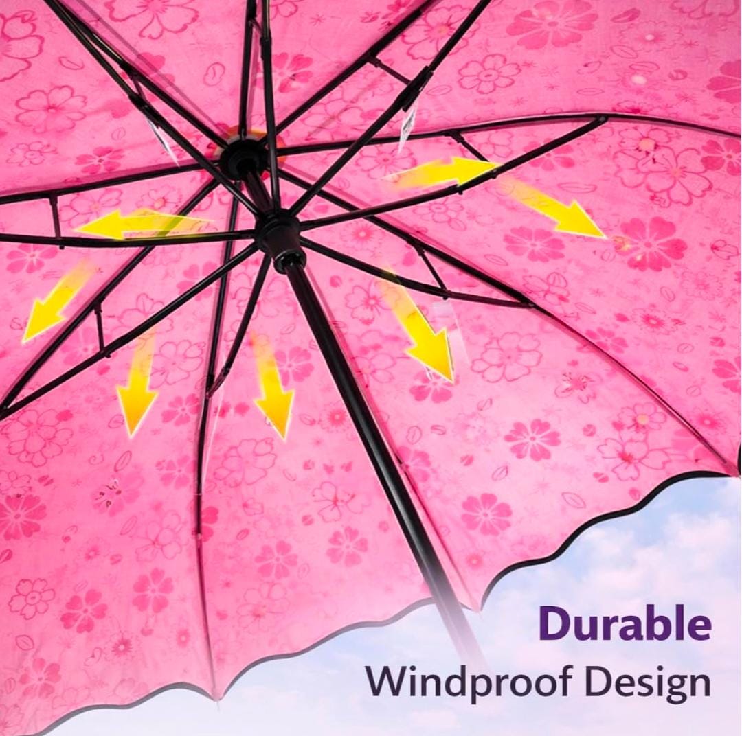 Miso station pink floral umbrella with a durable windproof frame and scalloped edges shown from an interior view
