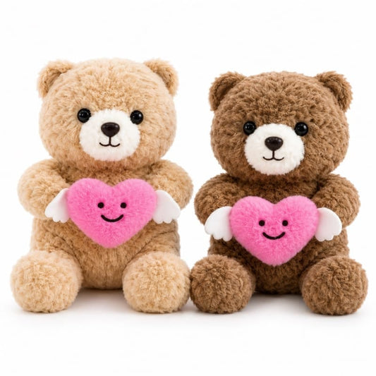 Miso station plush teddy bears in tan and brown holding pink hearts with white wings on a white background