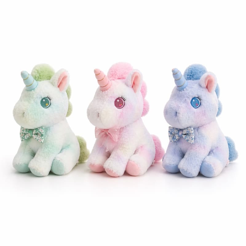Miso station plush unicorn trio with tie-dye fur, shimmering horns, and floral bow ties in sitting poses.