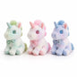 Miso station plush unicorn trio with tie-dye fur, shimmering horns, and floral bow ties in sitting poses.