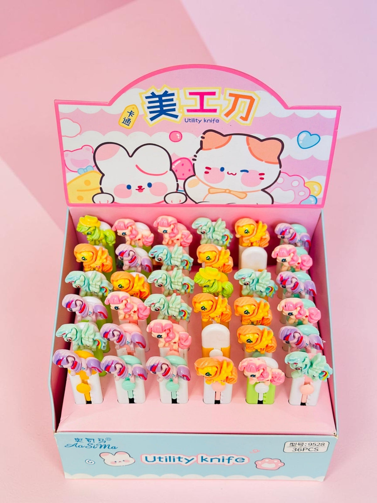 Miso station AoSiMa cartoon pony utility knives in a display box with colorful plastic figurines on retractable blades