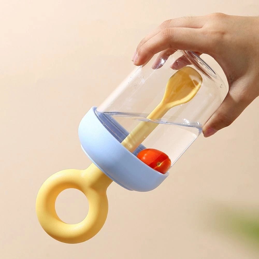 Miso station portable breakfast cup with a light blue lid, yellow handle, and integrated spoon for yogurt and fruit.
