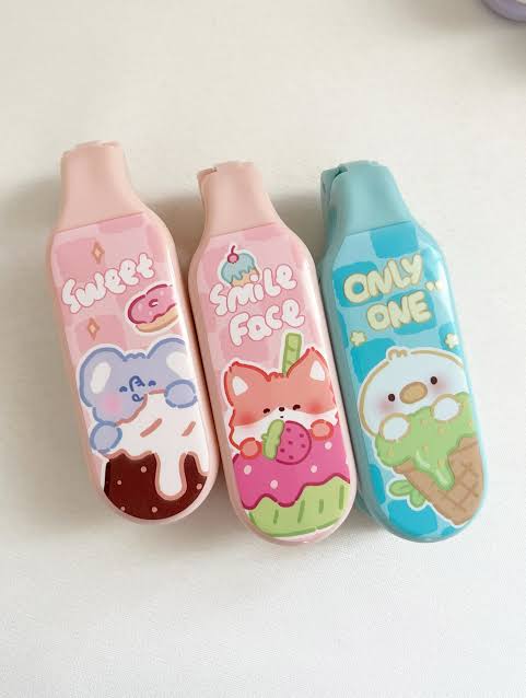 Miso station portable folding hair brushes in pastel pink and blue with cute kawaii character and dessert designs