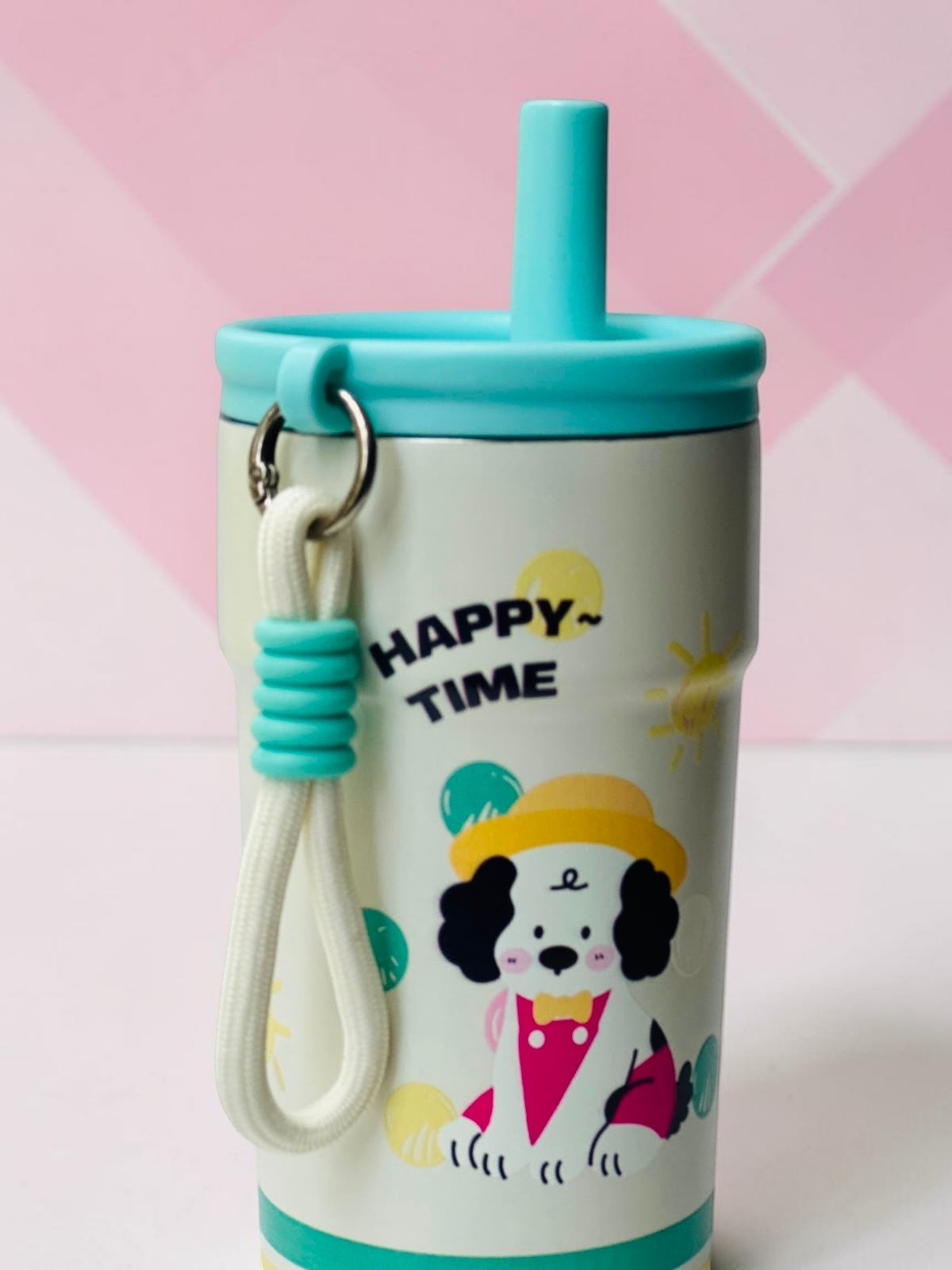 Miso station cream insulated tumbler featuring a puppy character with a yellow hat, teal lid, and carrying strap.