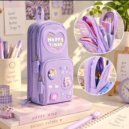 Miso station purple multi-compartment stationery pouch with 3D resin charms and glitter heart window on a desk