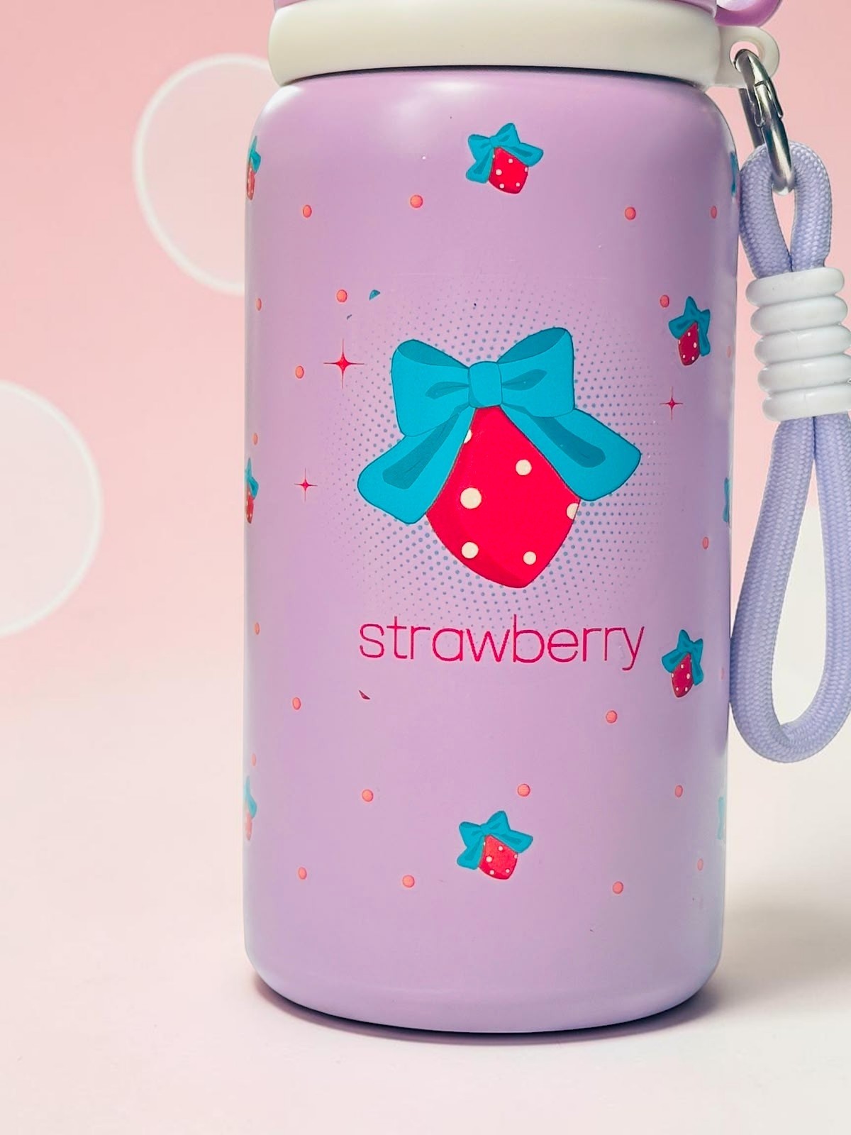 Miso station insulated stainless steel water bottle in pastel purple with strawberry and blue bow pattern