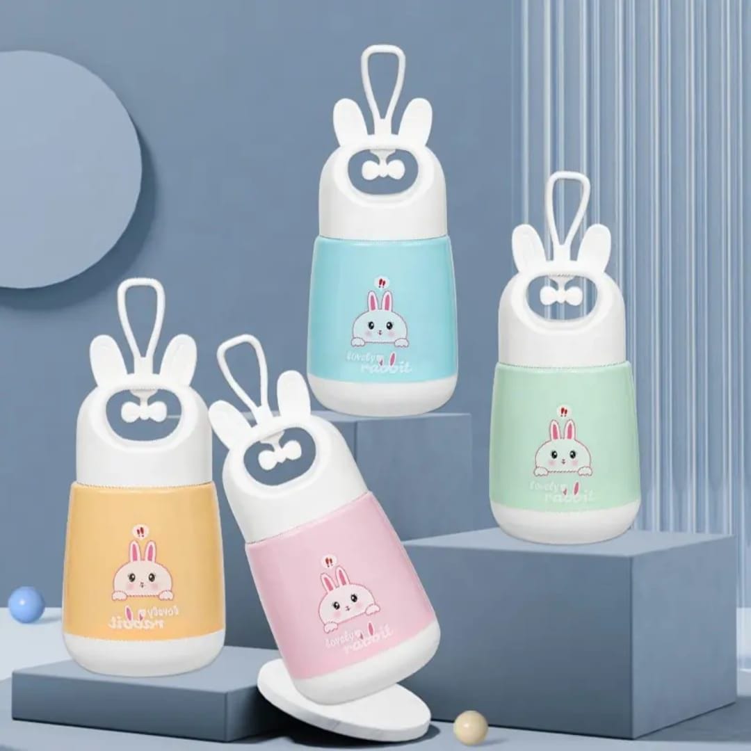Miso station portable rabbit water cups in pastel yellow, pink, blue, and green with cute ear-shaped carry handles.