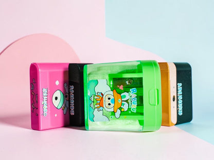 Miso station RABUBU green two-hole pencil sharpener with a transparent body and cute character illustration