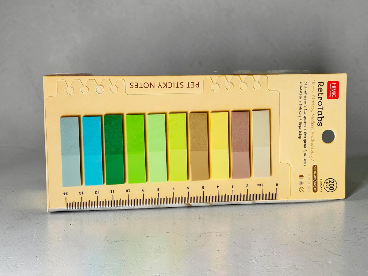 Miso station HIMIC RetroTabs PET adhesive page markers in a multi-color palette with a built-in ruler backing card.