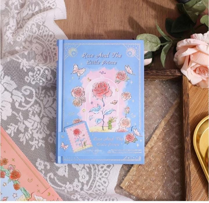 Miso station Rose and the Little Prince hardcover journal in light blue with gold-foil rose and butterfly illustrations