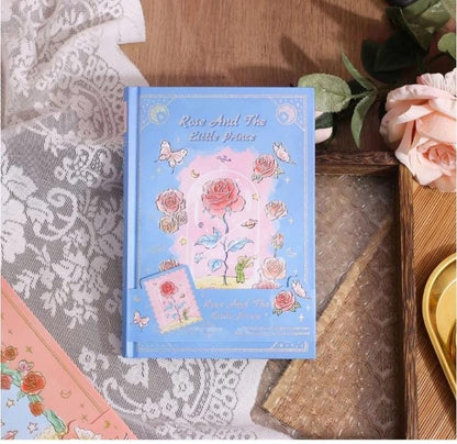Miso station Rose and the Little Prince hardcover journal in light blue with gold-foil rose and butterfly illustrations