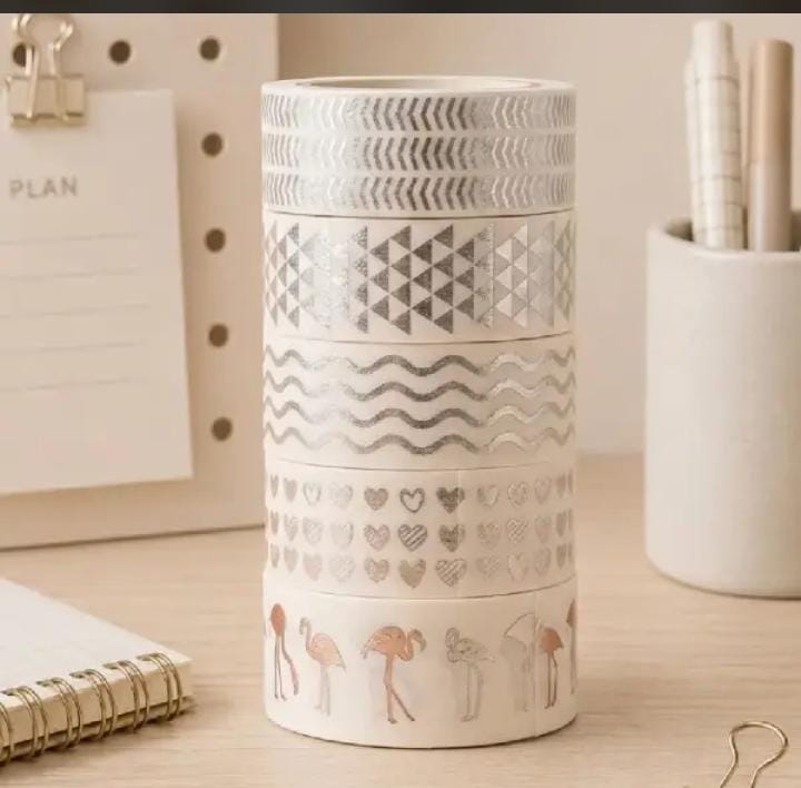 Miso station decorative washi tape set with silver foil patterns including hearts, waves, and flamingos on a desk.