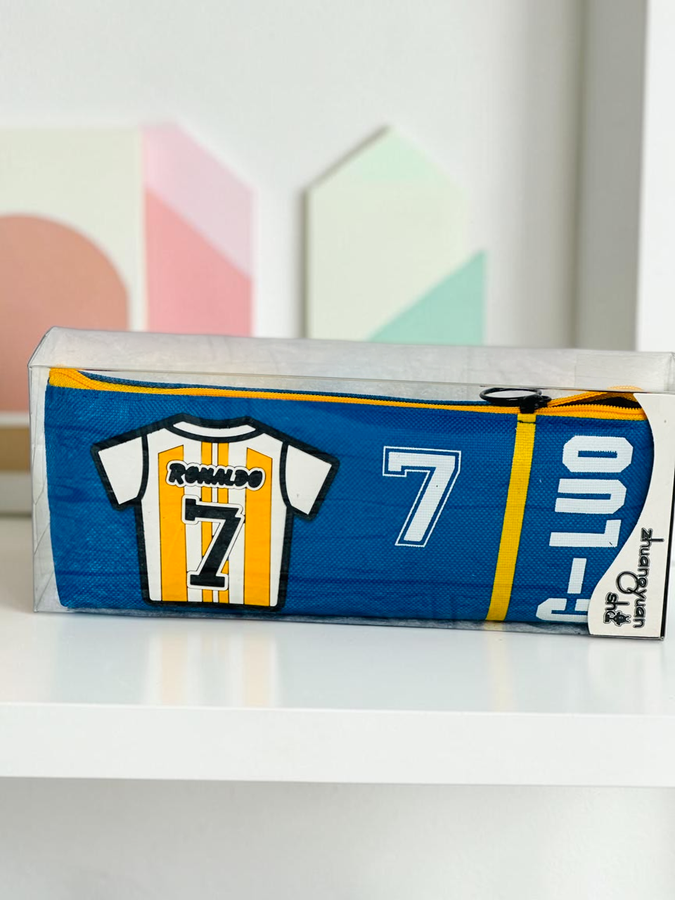 Miso station blue and yellow soccer jersey themed pencil case with Ronaldo number 7 graphic in clear packaging