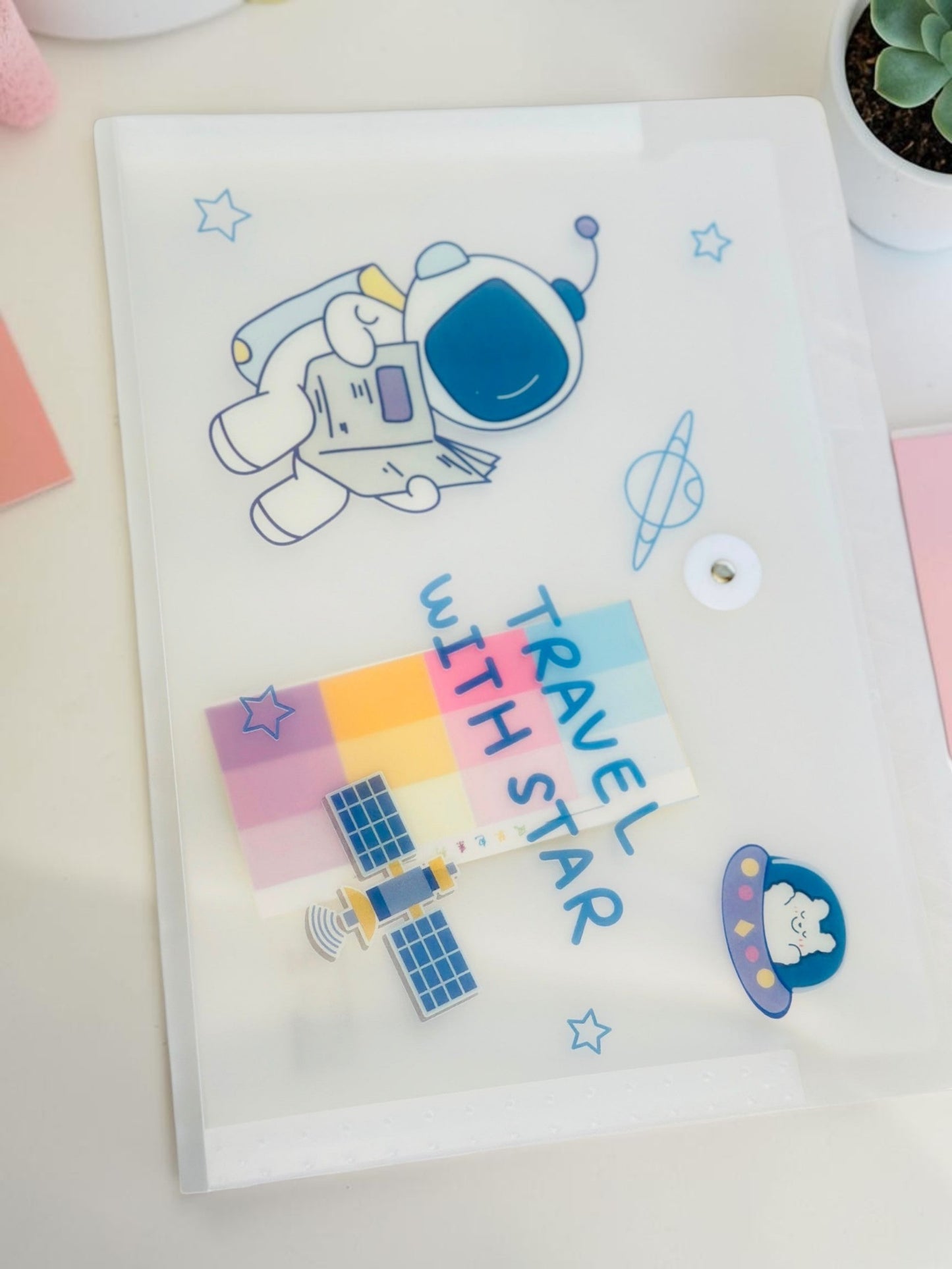 Miso station frosted plastic A4 document folder with cute space-themed astronaut and satellite illustrations