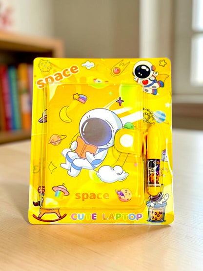 Miso station space-themed yellow notebook with astronaut design and matching pen in plastic blister packaging