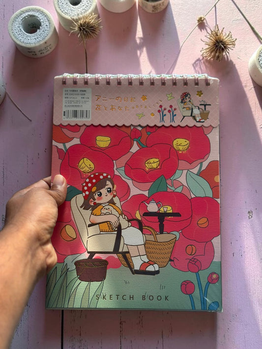 Miso station 16K spiral-bound sketchbook with a whimsical illustration of a girl relaxing among large red flowers.