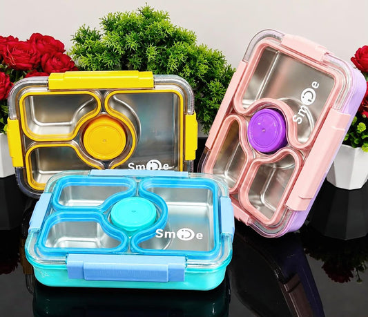 Miso station stainless steel bento lunch boxes in yellow, pink, and blue with leak-resistant transparent lids.