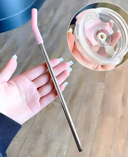 Miso station stainless steel reusable straw with a soft pink silicone tip and a clear spill-resistant tumbler lid